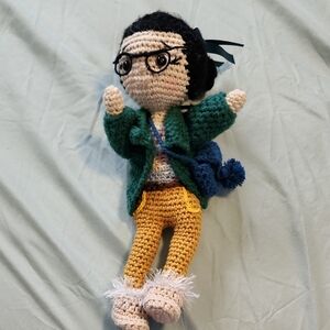 Handmade Crochet Doll with Green Jacket, Yellow Pants, Glasses And Booties.